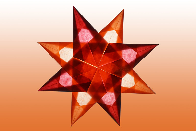 8 Zackiger rot orangener Stern